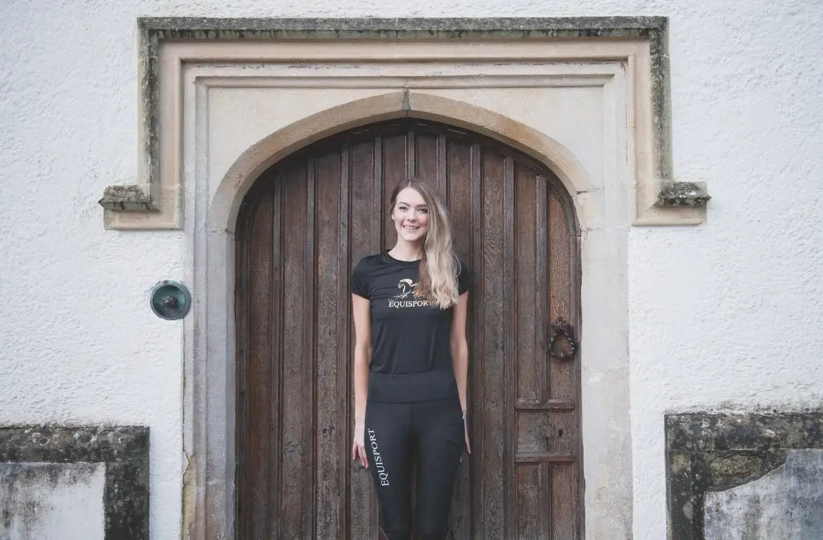 Equestrian Sports T-Shirt worn by young lady with smiling face black color brand Equisport