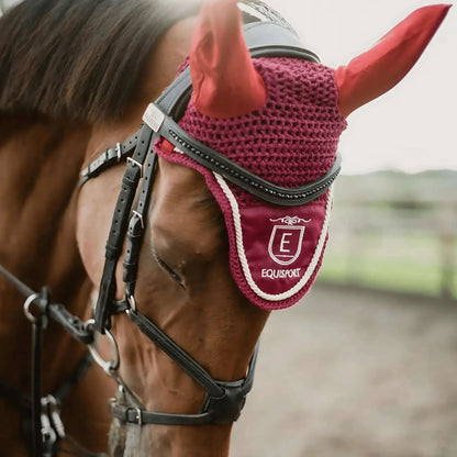 Equisport Equestrian Classic Fly Veil in Mulberry color with gold piping on a horse's bridle.